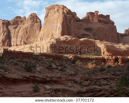 Eroded red rock revealing geologic layers in the Southwest desert