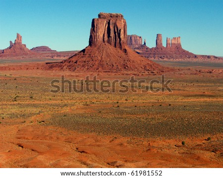 Red rock formations at Monument Valley in the early morning