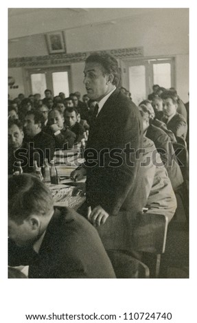 Central Bulgaria, BULGARIA, CIRCA 1960 - man takes the word (spoken) in the Communist meeting - circa 1960