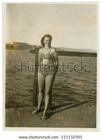 CENTRAL BULGARIA, BULGARIA-CIRCA 1950: Black Sea coast - Beauty in a two-piece swimsuit (bikini) - circa 1950