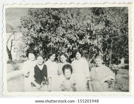 CENTRAL BULGARIA, BULGARIA district Plovdiv - CIRCA 1965: A group of women (middle aged and older women) posing in the hospital garden - Note: slight blurriness, better at smaller sizes- circa 1965