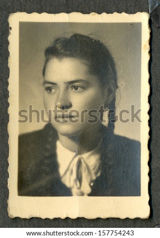CENTRAL BULGARIA, BULGARIA - CIRCA 1945 - Common portrait of young woman - Note: slight blurriness, better at smaller sizes - circa 1945