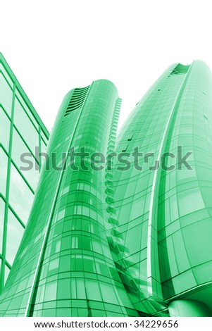 Tall green office buildings with glass windows