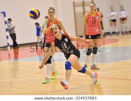 BUCHAREST, ROMANIA - FEBRUARY 18:Marina Vujovic try to save a point during the match between CSM Bucharest and CS Stiinta Bacau, Romanian Volleyball National Cup February 18,2015 Bucharest, Romania