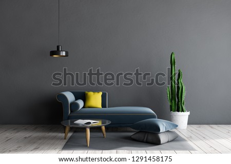 Interior of living room with gray walls, wooden floor, blue sofa with yellow cushion, round coffee table and pillow on the floor. 3d rendering