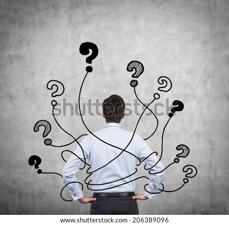Confused businessman because of a huge variety of thoughts. Thinking about structuring business process and solutions. Questions, different directions.