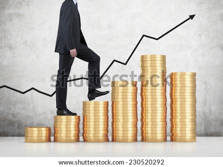 A businessman is going up, coins stair.