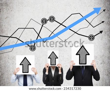 Business people are holding banners with drawn up arrows. Growth chart behind three persons on the wall.