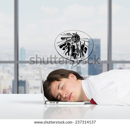 businessman sleeping on the job and dreams of entertainment