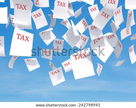 tax papers falling on a sky background