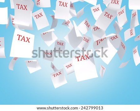 tax papers flying on a blue background