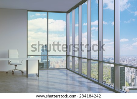 A workplace in a modern corner panoramic office in Manhattan, New York. A concept of financial consulting services.