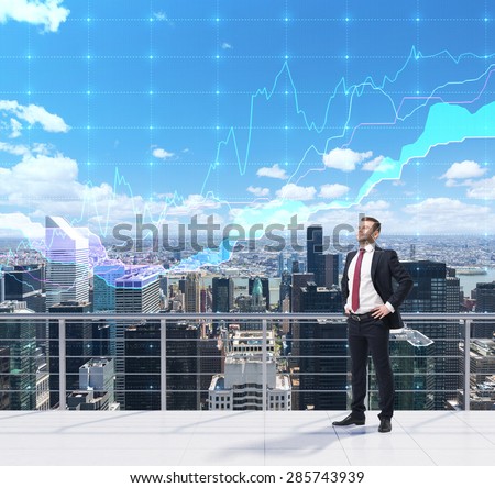 Trader on the roof in New York city. Forex chart over the sky. A concept of prosperous portfolio management process.