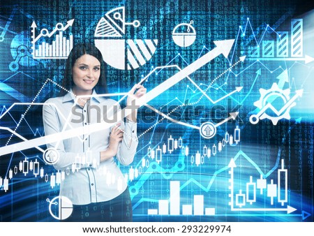 Portrait of smiling woman who points out the blue digital financial charts. Global capital markets concept.