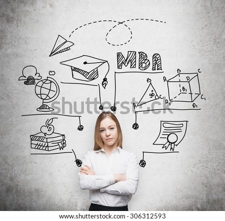 Young beautiful lady with crossed hands is going to get the master\'s degree in business administration. A concept of the MBA degree. Drawn educational icons on the concrete wall.
