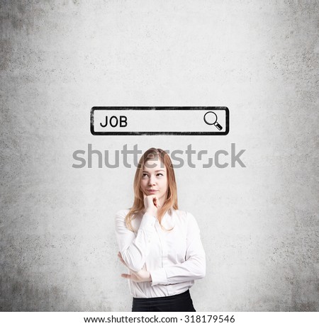 Beautiful lady in formal clothes is thinking about the best way to find a job. The concept of the looking for a job in the Internet. Searching line are drawn on the concrete wall.