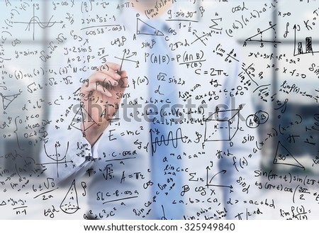 Quantitative analyst is drawing different math formulas on the glass screen. A concept of professional financial consulting services.