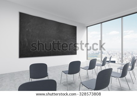 A classroom or presentation room in a modern university of fancy office. Black chairs, panoramic windows with New York view and a black chalkboard on the wall. 3D rendering.