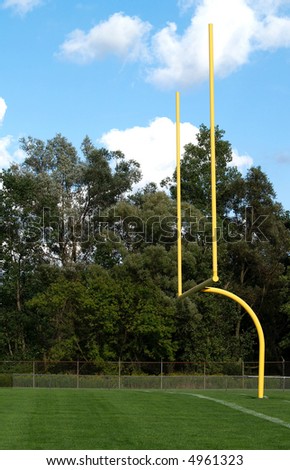 yellow goalposts for an American football game