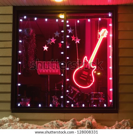 closed music store at night in the winter