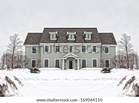 colonial style home in wintertime