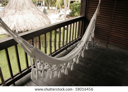 white hammock on a balcony