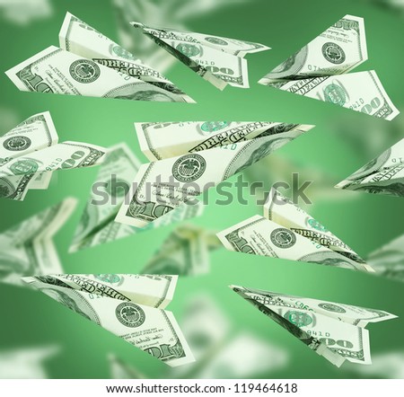 money dollars airplane fly on green background