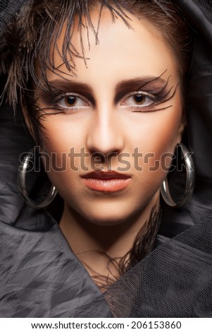 Woman with black darck gothic make up. Sensuality. Witch. Fashion make up. Professional