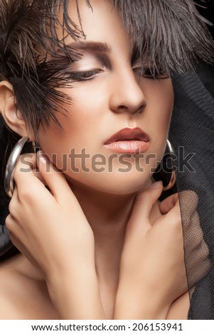 Gorgeous woman gothic style make up. Fashion art style make up. Close up portrait. Glamour