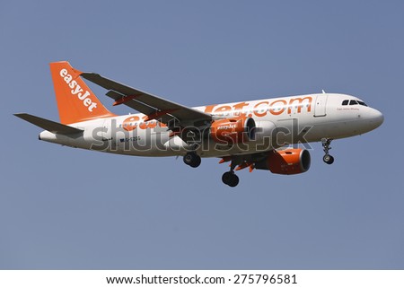 THESSALONIKI, GREECE - August 18, 2014: easy jet low cost airline, Airbus A320 aircraft landing at International Airport \'Makedonia\', Greece