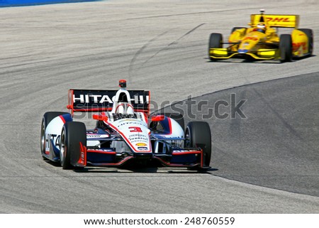 Milwaukee Wisconsin, USA - August 16, 2014: Verizon Indycar Series Indyfest ABC 250 Practice and Qualifying sessions on track action. Helio Castroneves Sao Paulo, Brazil Hitachi Team Penske