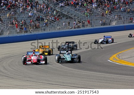 Milwaukee Wisconsin, USA - August 17, 2014: Verizon Indycar Series Indyfest ABC 250  race day on track action. 19 Justin Wilson Sheffield and 15 Graham Rahal  lead the pack of cars