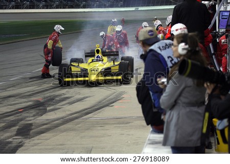 Joliet Illinois, USA - August 29, 2009: IndyCar Racing League. Night Race, under the lights, action in the pits, Chicagoland speedway. Dario Franchitti
