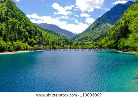 View of Panda Lake at Jiuzhaigou.  Jiuzhaigou is a nature reserve famous for its colorful lakes located in the Tibetan-Qiang, Sichuan. It is one of the most visited sites in China.