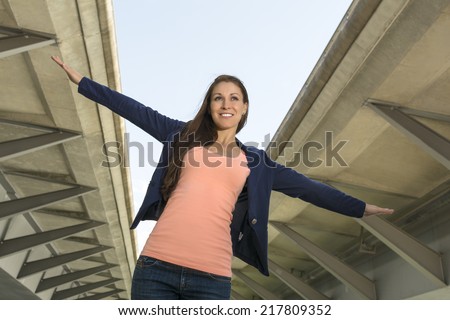 Happy self confident woman in urban environment, Outdoor Shot