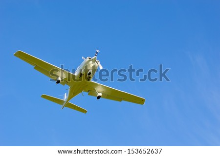 Small airplane in clear sky