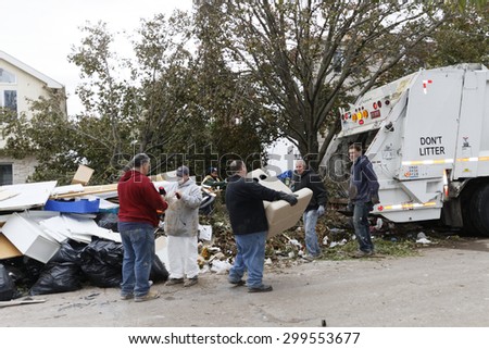 STATEN ISLAND, USA - NOVEMBER 4: The images of devastation caused by the Hurricane Sandy  and rescue services response November 4, 2012 on the streets of Staten Island, USA.