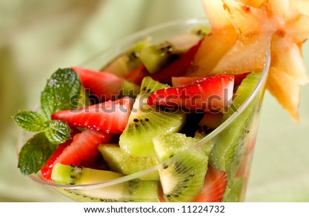 A healthy snack of berries, kiwi and star fruit