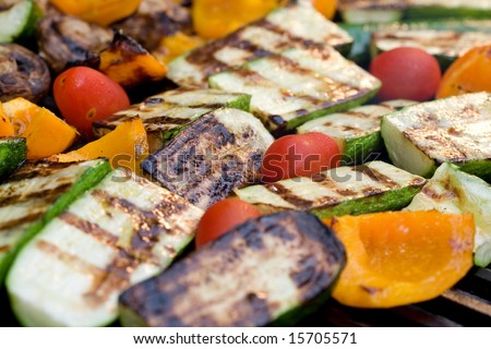 Grilled Vegetables. Zucchini, tomato, pepper, and mushroom barbecue.