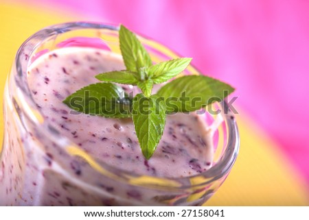 A blended smoothie of yogurt, berries, and protein powder.