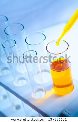 Refinery Laboratory Lab Tube in yellow oil sample