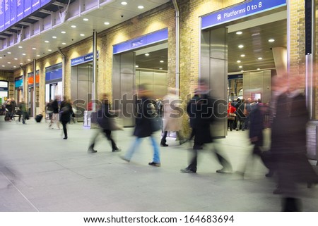 London City Train Tube, Blur people movement in rush hour, King Cross station