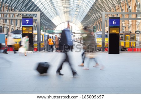 London Train Tube station Blur people movement in rush hour, at King\'s Cross station, England, UK