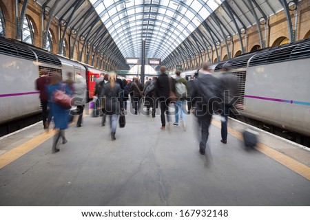 London Train Tube Station Blur People Movement In Rush Hour At King'S Cross Station, England, Uk