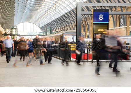 London Train Tube station Blur people movement in rush hour at King\'s Cross station, England, UK