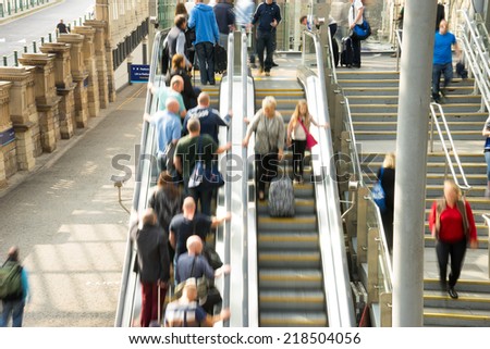 Train Tube station Blur people movement in rush hour at Edinburgh, Scotland, UK