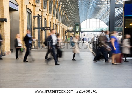 London Train Tube station Blur people movement in rush hour at King's Cross station, England, UK