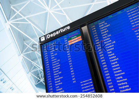 Flight information, arrival and departure board at the airport