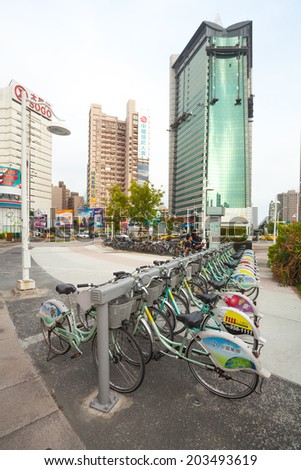 KAOHSIUNG - TAIWAN July 06: The public bicycle for resident and  tourists rent for travelling in downtown. 06 July 2014. The public bycicle are located at MRT station in  Kaohsiung, Taiwan. Kaoshiung