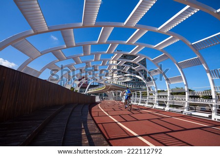 KAOHSIUNG - TAIWAN July 12: Star-of-Cianjhen Bike Bridge is located near Kaisyuan MRT station. People and bicycle can use this bridge across the Kaizuan 4th road. Kaohsiung, Taiwan. on July 12, 2014